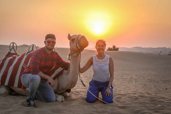 1-Hour Dune Buggy Self Drive with Camel Ride and Sand Boarding in Red Dunes - Camel riding and sandboarding after the buggy