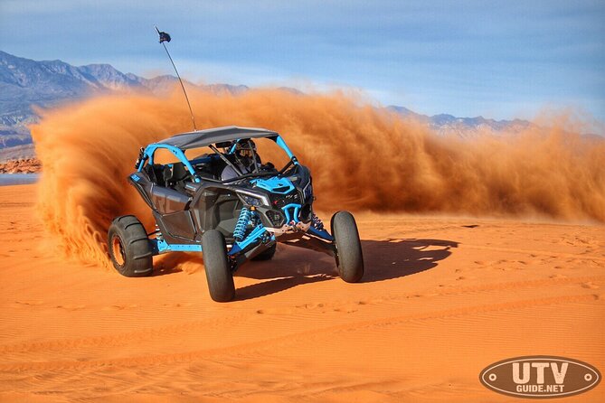 1-Hour Dune Buggy Self Drive with Camel Ride and Sand Boarding in Red Dunes - Taking the wheel in a 2-seater buggy