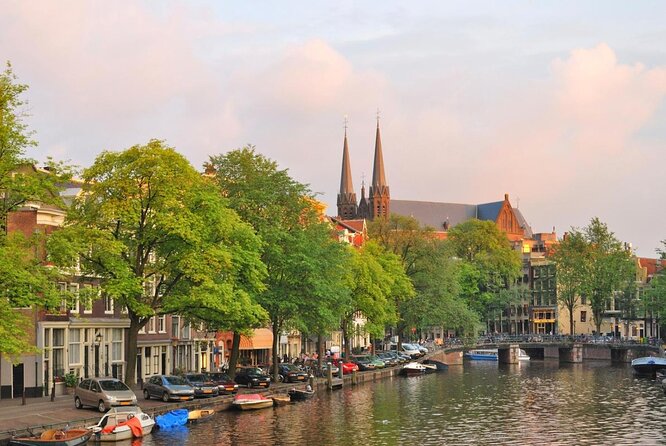 Amsterdam 1h Canal Cruise by Semi-Open Boat with Audio Guide - Key points at a glance