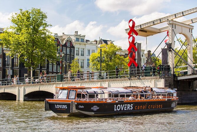 Amsterdam 1h Canal Cruise by Semi-Open Boat with Audio Guide - What the semi-open boat adds