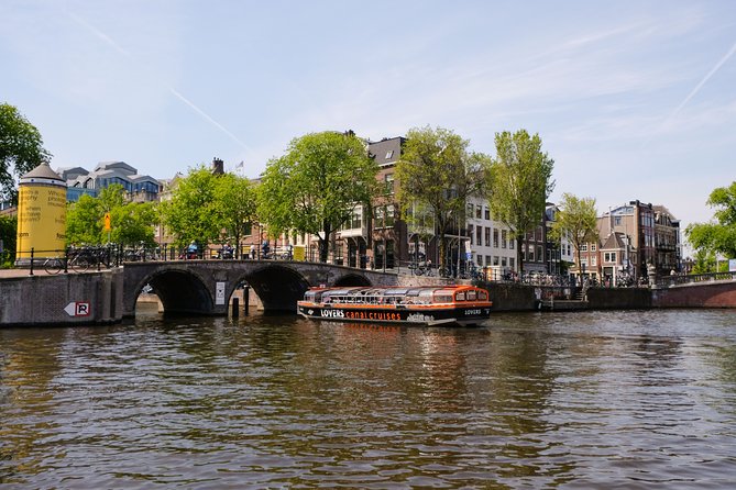 Amsterdam 1h Canal Cruise by Semi-Open Boat with Audio Guide - Grand homes at the Golden Bend