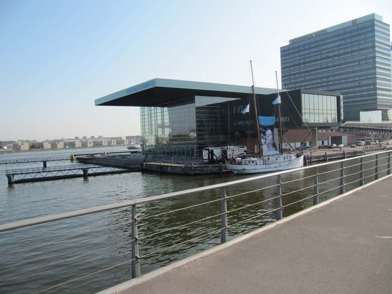 Amsterdam:: Bike Rental with Free Self-Guided Tour - Taking the ferry into the Dutch countryside