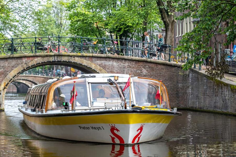 Amsterdam: Heated Canal Cruise Including Audioguide - Leaving Centraal Station and entering the old city