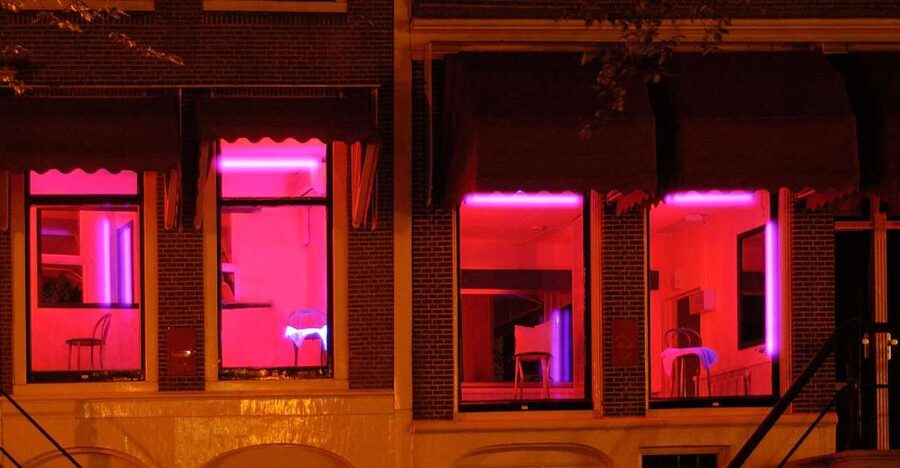 Amsterdam: Red Light District 1-hour Smartphone Audio Tour - Finishing at Nieuwmarkt and the Waag