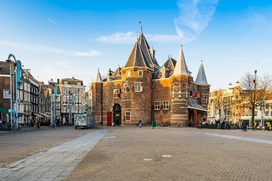 Amsterdam: Red Light District 1-hour Smartphone Audio Tour - Starting at Dam Square and the city’s first chapter