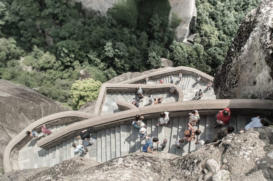 Athens: Meteora Day Trip with Central Pickup & Audio Guide - Stairs, clothing, and monastery etiquette