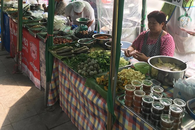 Bangkok's Wireless Road: A Self-Guided Audio Tour - Thai beliefs in spirit houses and the Trimurti shrine