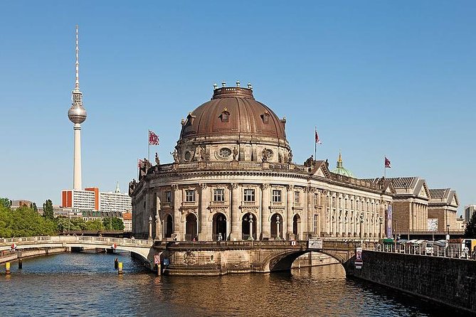 Berlin's Museum Island: A Self-Guided Audio Tour - Crossing Schlossbrücke and reading Prussian symbols