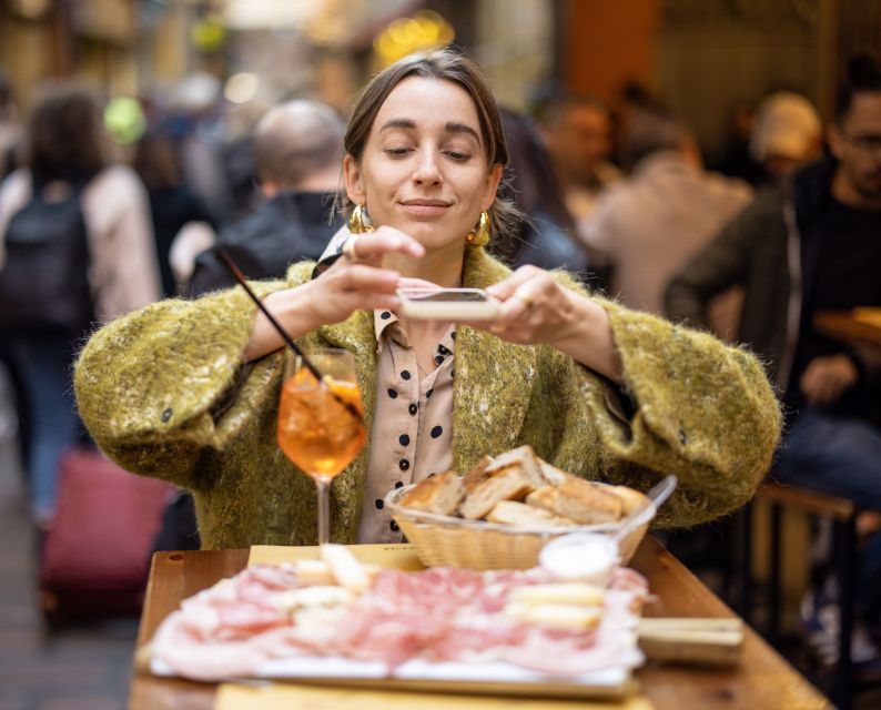 Bologna: Self-Guided Food Tasting Tour with Vouchers - Weather, access, and practical details