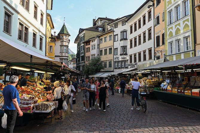Bolzano Walking Tour with Audio and Written Guide by a Local - Via della Mostra and Piazza del Grano reveal old Bolzano