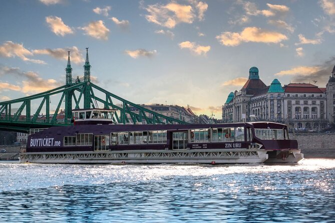 Budapest Danube 1 Hour Sunset or Night Cruise with Audio Guide - Inside seating, open deck, and onboard comfort