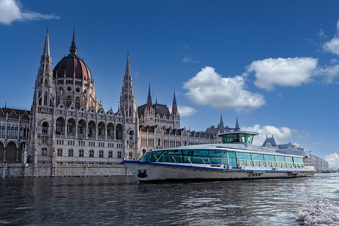 Budapest Danube Cruise with Drink, Audio Guide, Margaret Island - Choosing your seat on the glass-enclosed boat