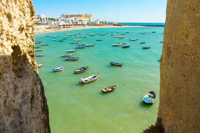 Cadiz: City Walk with Audio Guide in 7 Languages on your Phone - Plaza de San Juan de Dios and the city gates