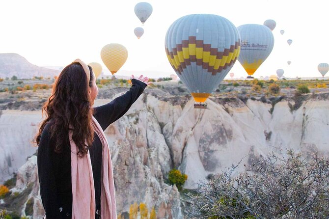 Cappadocia Sunrise Hot Air Balloon Watching Tour With Audio Guide - Love Valley Under a Sky Full of Color