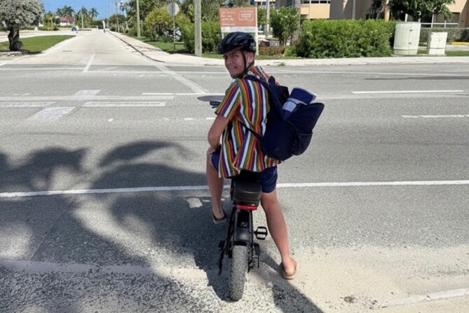 Coastal E-Bike Adventure: Full-Day Self-Guided Tour Grand Cayman - Camana Bay adds shops, food, and a change of pace