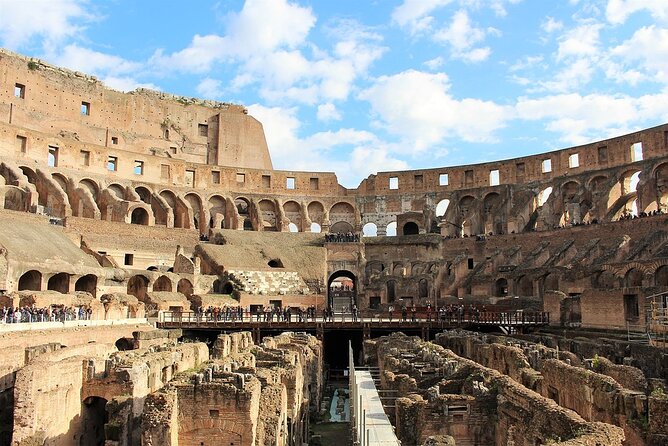 Colosseum, Forum, Palatine Hill with audio guide and Arena or Bus option - Entering the Colosseum with a nominative ticket