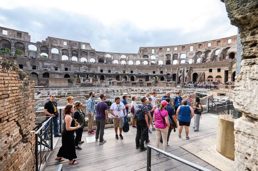 Colosseum, Roman Forum, Palatine Hill access and AudioGuide - Walking through the Roman Forum