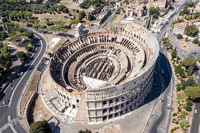 Colosseum, Roman Forum & Palatine Hill Access with Audio Guide - Inside the Colosseum: spectacle, stone, and crowds