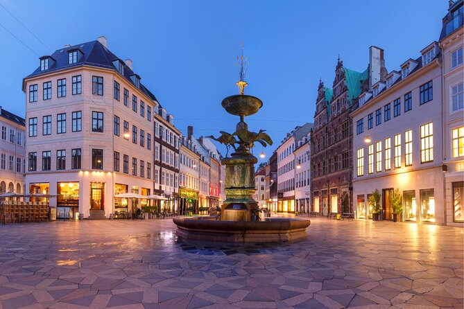 Copenhagen Scavenger Hunt and Highlights Self Guided Audio Tour - The Stock Exchange and Royal Danish Theater show old Copenhagen’s public face