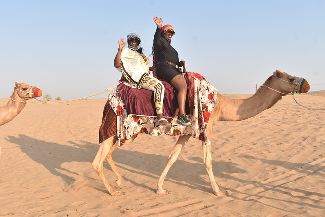 Dubai: 60Minute Self-Drive ATV Quadbike, Camel Ride, Sand Surfing - Sand surfing gives you a quick burst of fun