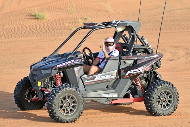 Dubai Desert Dune Buggy Self-Drive Experience with Hotel Transfer - Getting ready with goggles, water, and a Ghutrah