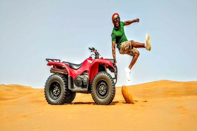 Dubai Desert Safari With Camp Activities and ATV Self Drive Quad Bike - Sunset over the red desert