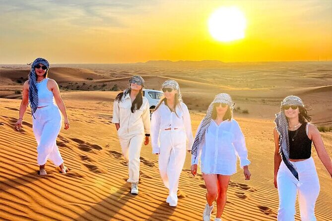 Dubai Desert Safari with Self Drive Quad Biking & Camel Riding - Quad biking across the golden dunes
