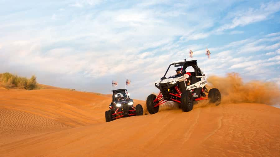 Dubai: Self-Drive 4WD Dune Buggy Guided Desert Adventure - What the guide adds to the ride