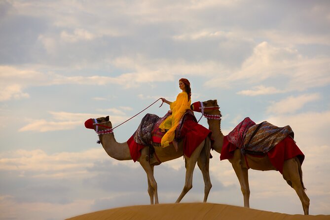 Dubai Self-drive Quad Bike, Sand Boarding, Camels & Refreshments - Riding the Red Dunes on Your Own Quad