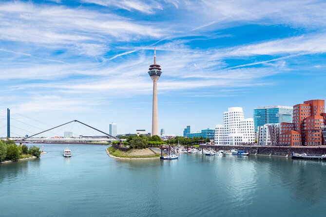 Dusseldorf: City Walk Audio Guide in 7 Languages on your Phone - Königsallee, canals, and the polished side of Düsseldorf