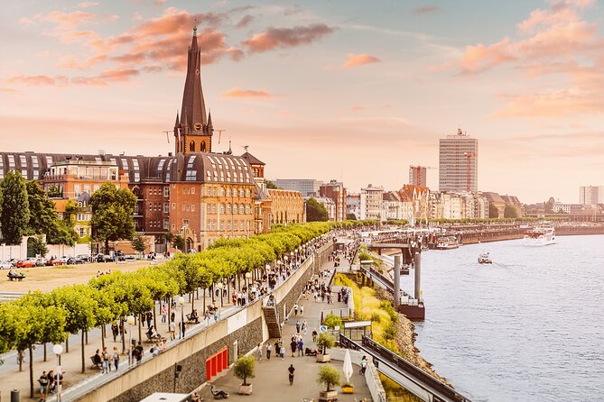 Dusseldorf: City Walk Audio Guide in 7 Languages on your Phone - Market square and the smaller stories along the way
