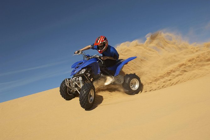 Evening Desert Safari with BBQ Dinner & self-drive Quad biking - Lahbab’s red dunes deliver the biggest rush