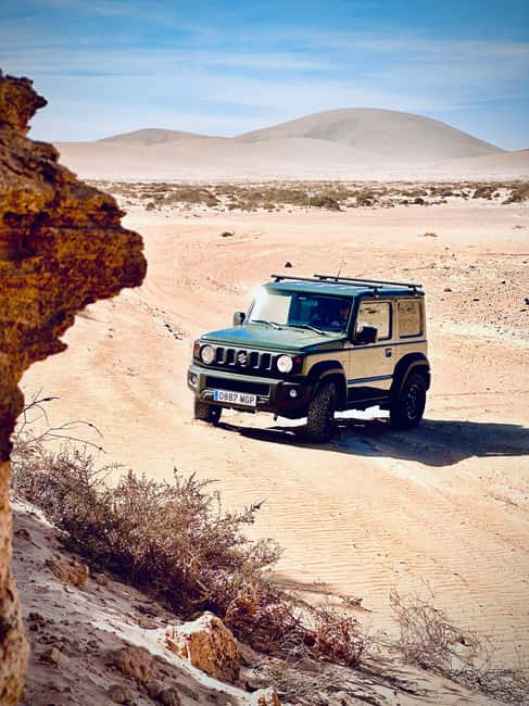 From Corralejo: Fuerteventura Self-Drive 4x4 Jeep Tour - Driving through the dry river canyon