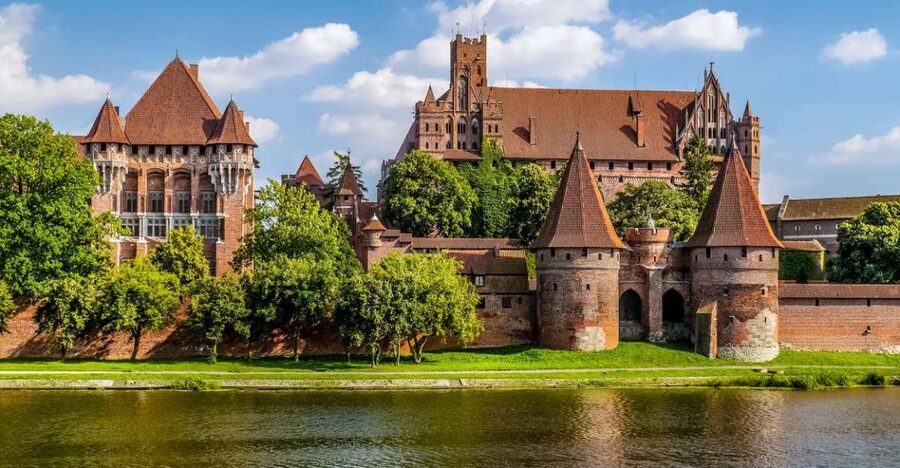 From Gdansk: Half-Day Malbork Castle Tour with Audioguide - Entering the castle and starting the audio tour