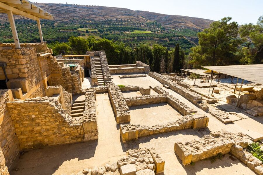 Knossos Palace: E-ticket with Audio and Heraklion City Tour - Walking through the palace at Knossos