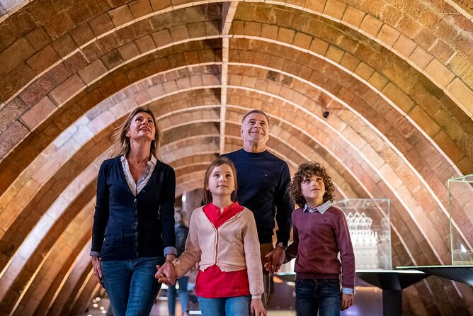 La Pedrera-Casa Mila Admission Ticket with Audioguide - Entering through Gaudí’s flowing courtyards