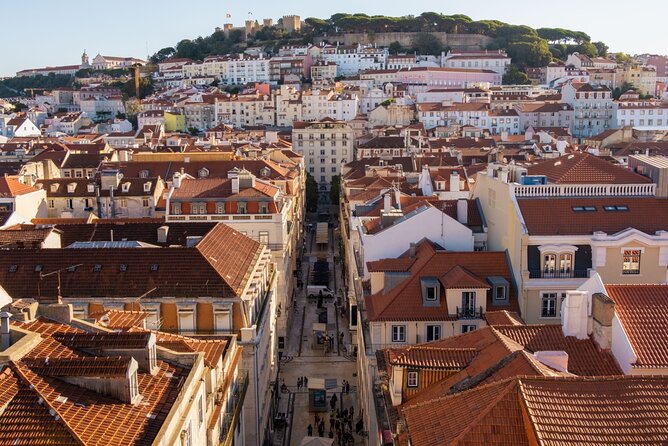 Lisbon (Chiado-Baixa) Scavenger Hunt and Sights Self-Guided Tour - Rua Augusta Arch opens the route toward the river