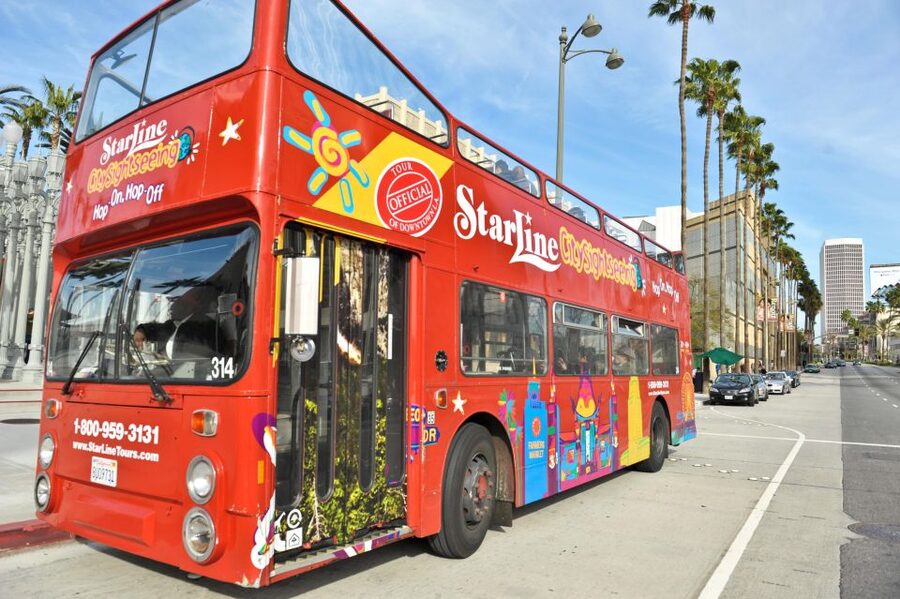 Los Angeles: Hop-On Hop-Off Bus Tour with Audio Guide - Audio commentary and the open-top ride