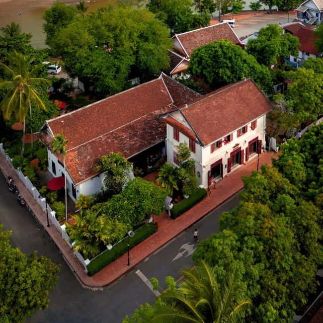 Luang Prabang: Audio-Guided City Tour in Electric Car - Starting at Wine & Co on Sakhaline Road