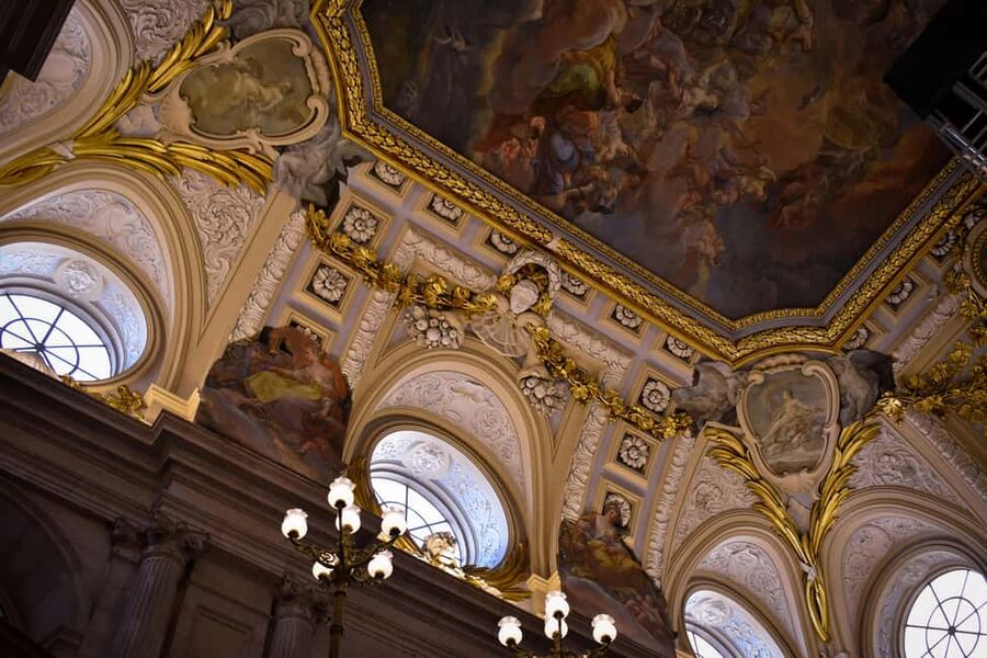 Madrid: Royal Palace Entry with Audio Guide - Collecting your ticket at Plaza de España 9