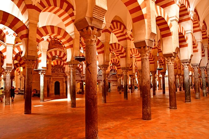 Mosque-Cathedral of Córdoba E-Ticket with Audio Guide - Inside the Mosque-Cathedral with a phone in hand