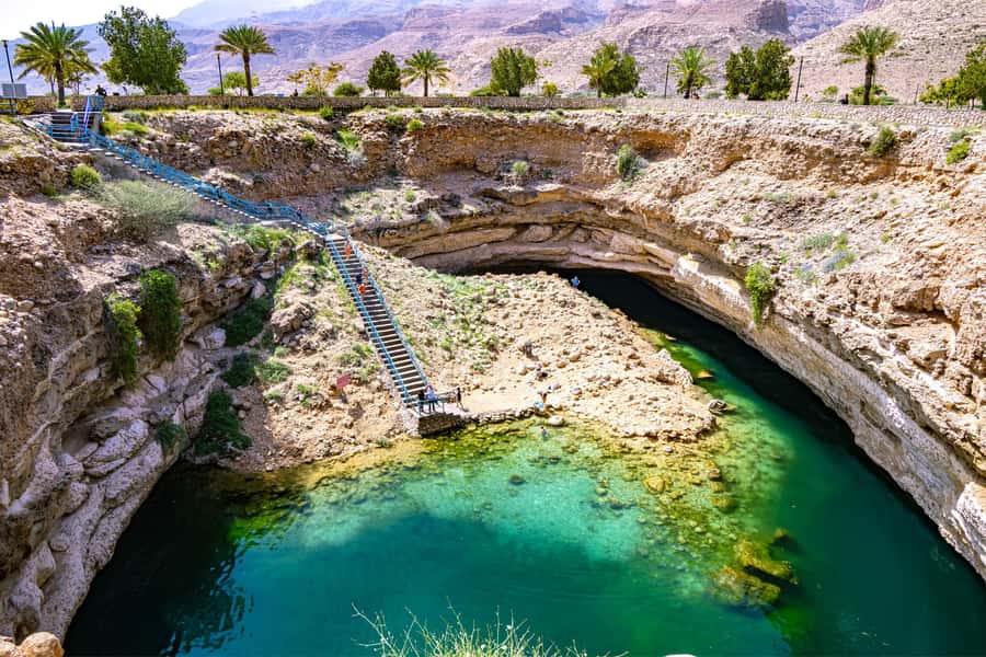 Muscat: Southern Treasures & Wadi Shab Tour with Audio Guide - Walking into Wadi Shab