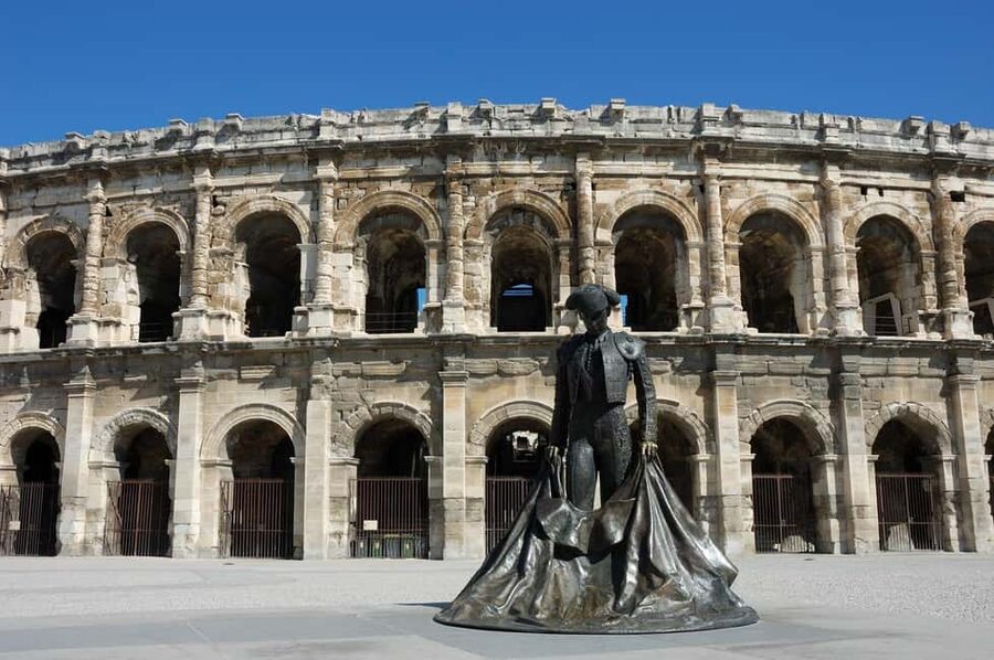 Nimes: Ancient Roman Arena Ticket & Old Town Audio Tour - Seeing the arena through the audio guide