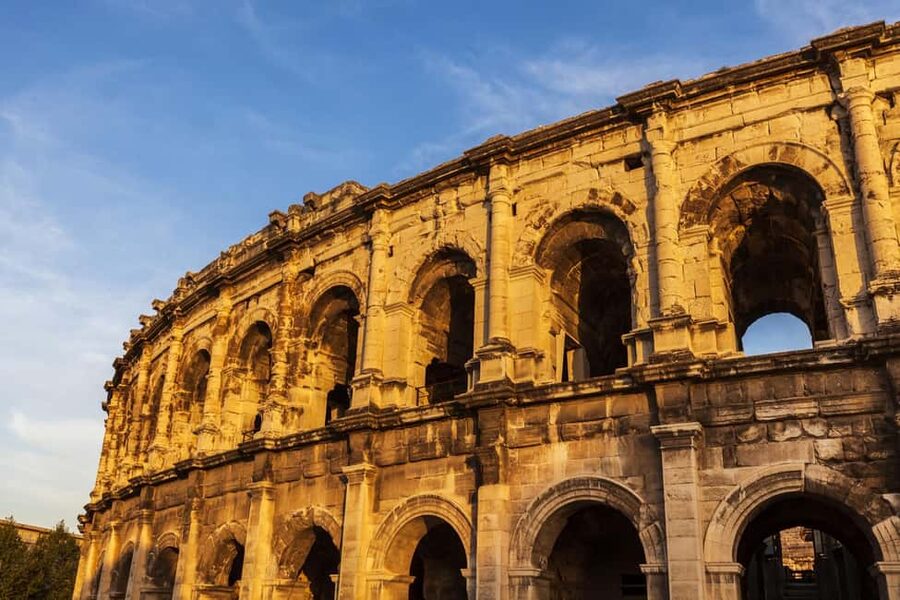 Nimes: Ancient Roman Arena Ticket & Old Town Audio Tour - Practical tips for a smoother visit