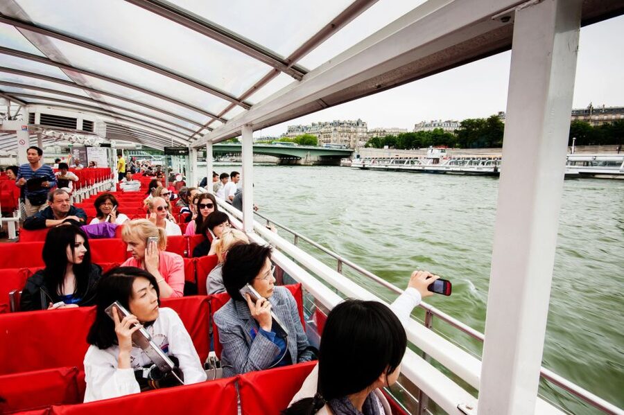 Paris: Audio-Guided Bus Tour & Seine River Cruise - Boarding the Trimaran at the Seine