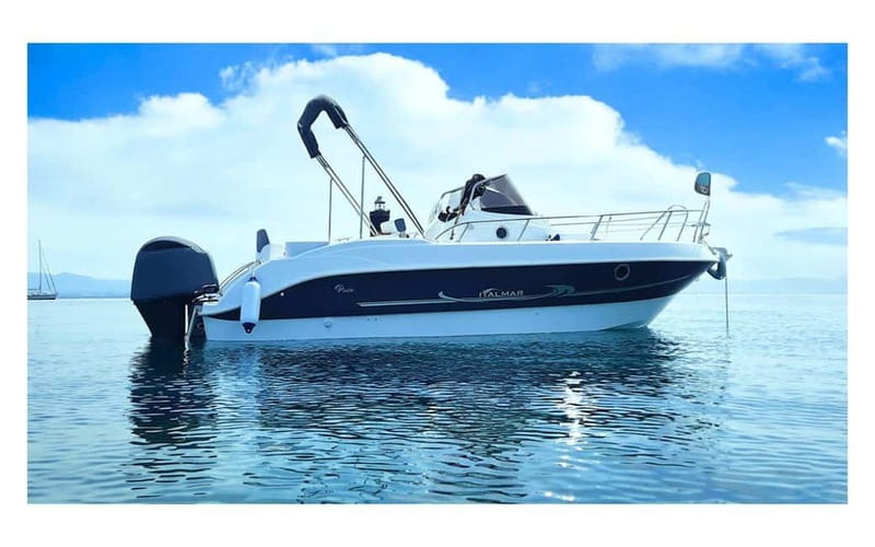 Puerto Colon: License-Free Self-Drive Boat in Tenerife - Taking the helm at Puerto Colón
