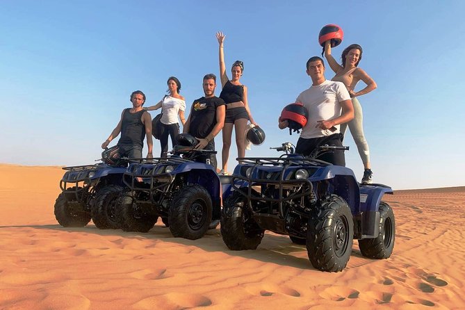 QUAD BIKE self Drive with Desert safari Full Program - Sandboarding, camels, and the sunset stop