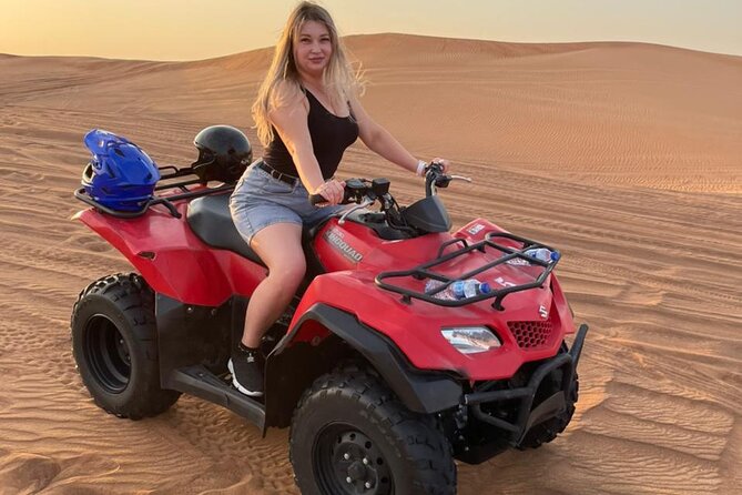 QUAD BIKE self Drive with Desert safari Full Program - Taking on the red dunes near Al Madam