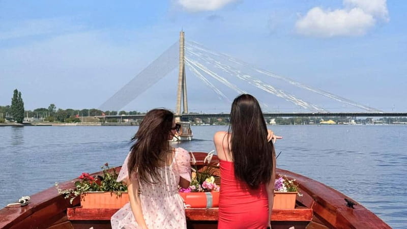 Riga: Canal Boat Tour with Welcome Drink & Audio Guide - Through the Riga Canal and city parks