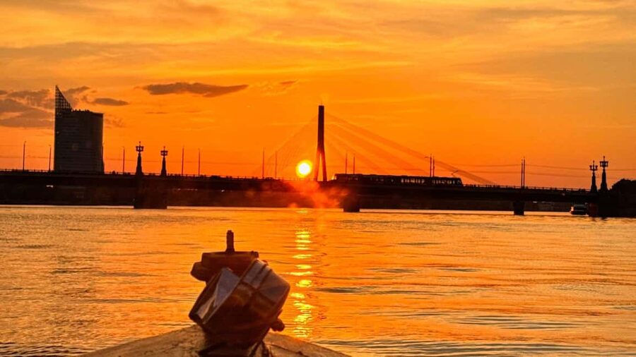 Riga: Canal Boat Tour with Welcome Drink & Audio Guide - Riga Central Market from the water